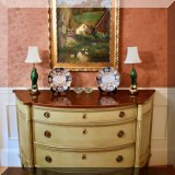 F26. Painted demilune chest with flame mahogany top. 34”h x 58”w x 23”d 